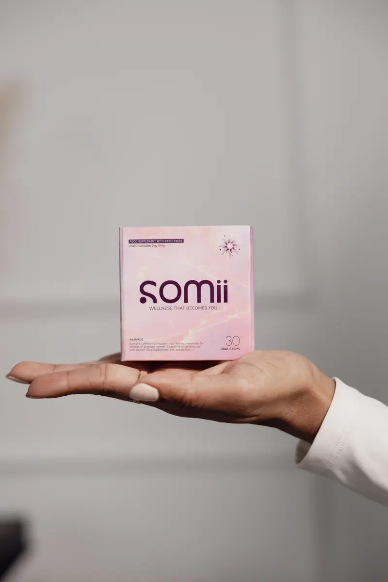 A Somii box resting on an open hand